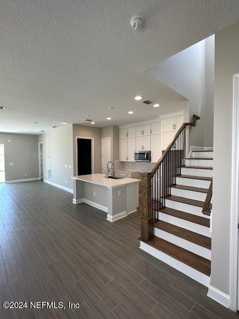 385 Rum Runner Way, Unit 49 St. Johns, FL 32259 - Photo 3 of 34 a view of kitchen with wooden floor and electronic appliances