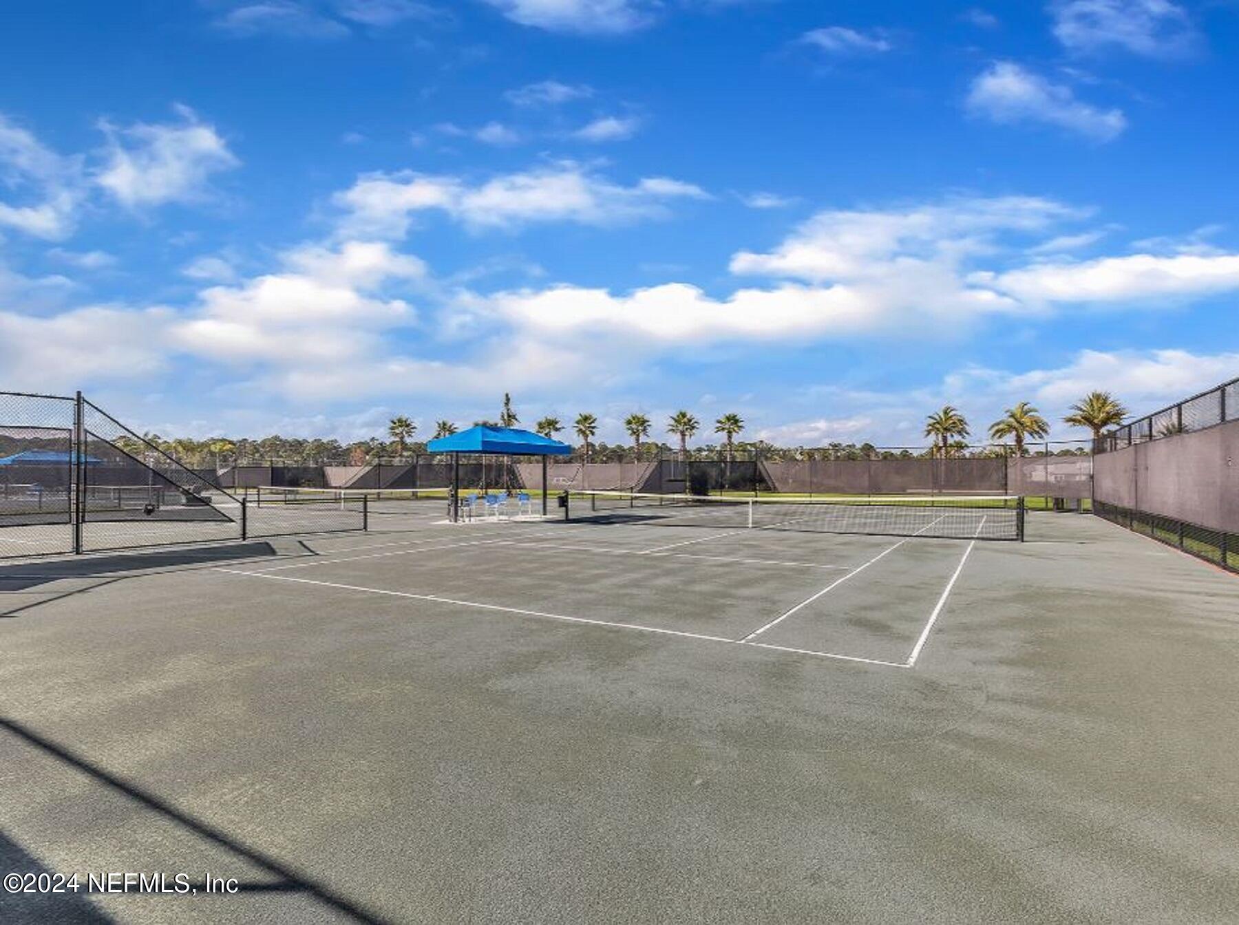 385 Rum Runner Way, Unit 49 St. Johns, FL 32259 - Photo 33 of 34 a view of a tennis court