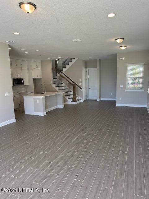 385 Rum Runner Way, Unit 49 St. Johns, FL 32259 - Photo 9 of 34 a view of entryway and hall with wooden floor