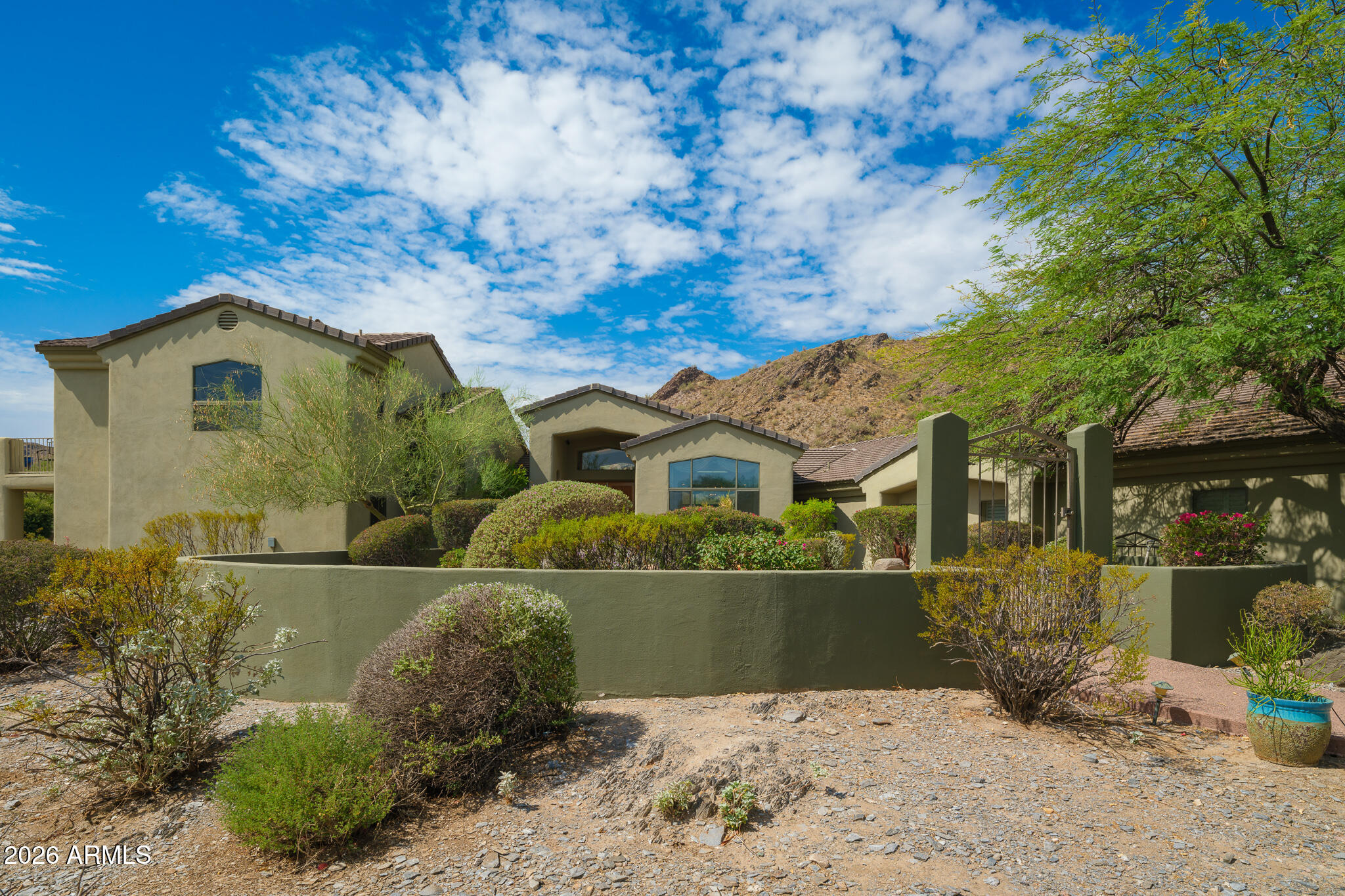 2329 East Hatcher Road Phoenix, AZ 85028 - Photo 1 of 40 a front view of a house with a yard