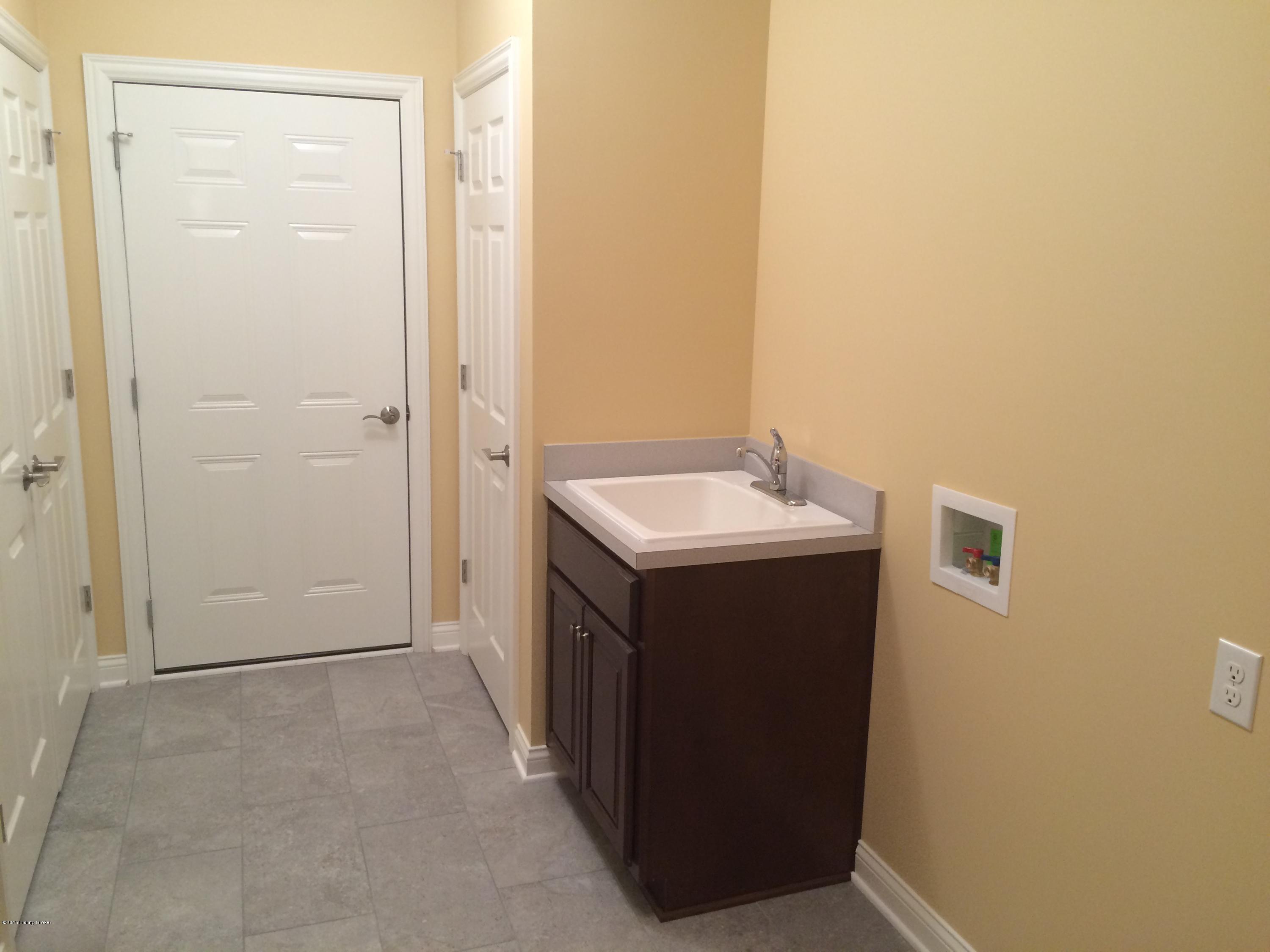 10510 Rile Road Louisville, KY 40223 - Photo 6 of 14 Laundry with sink and cabinet
