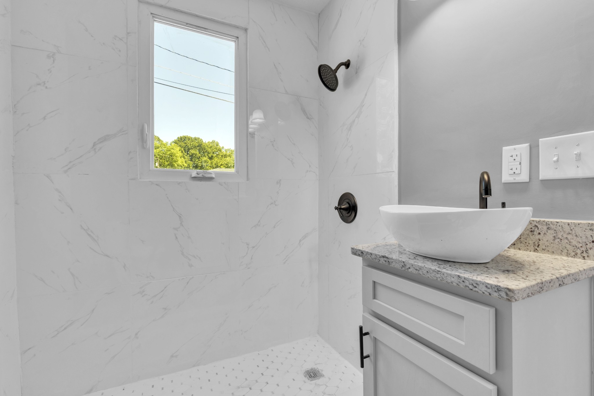 223 East 4th Avenue Springfield, TN 37172 - Photo 12 of 13 a bathroom with a granite countertop sink and a bathtub