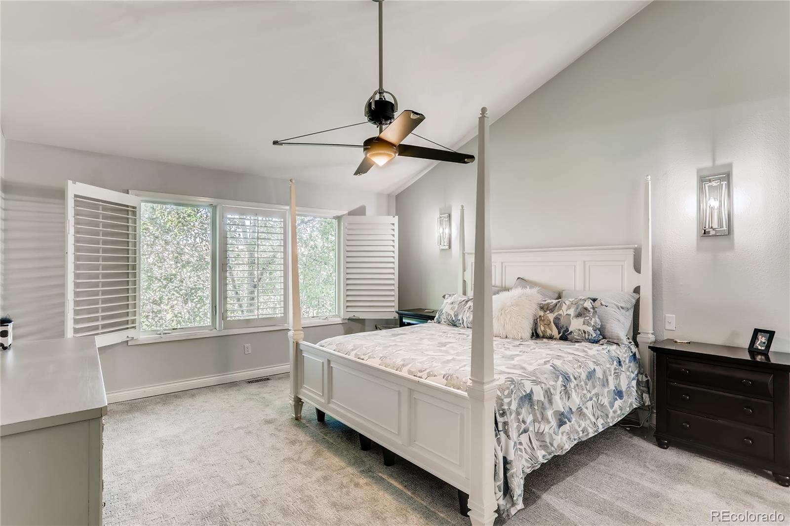 2883 East Ravenhill Circle Highlands Ranch, CO 80126 - Photo 10 of 25 a bedroom with a bed and a window