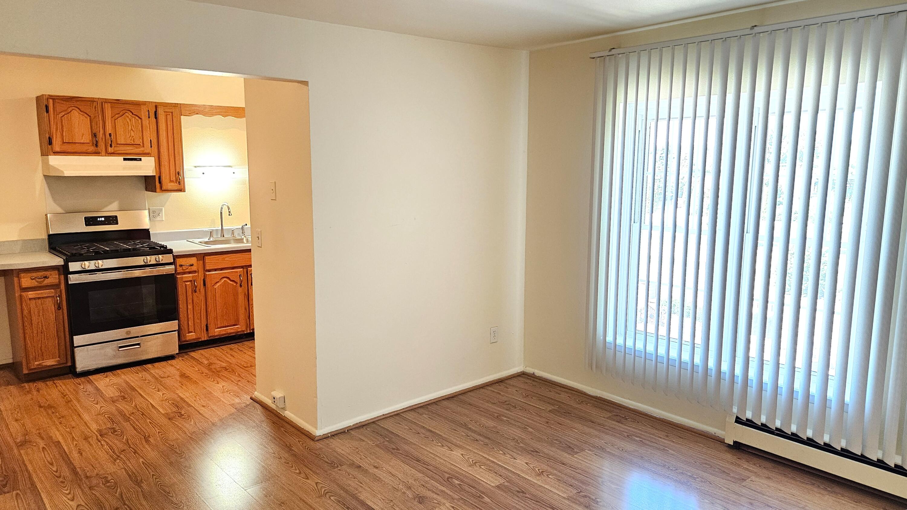 9500 North Green Bay Road, Unit 301 Brown Deer, WI 53209 - Photo 12 of 28 Living Room towards kitchen.
