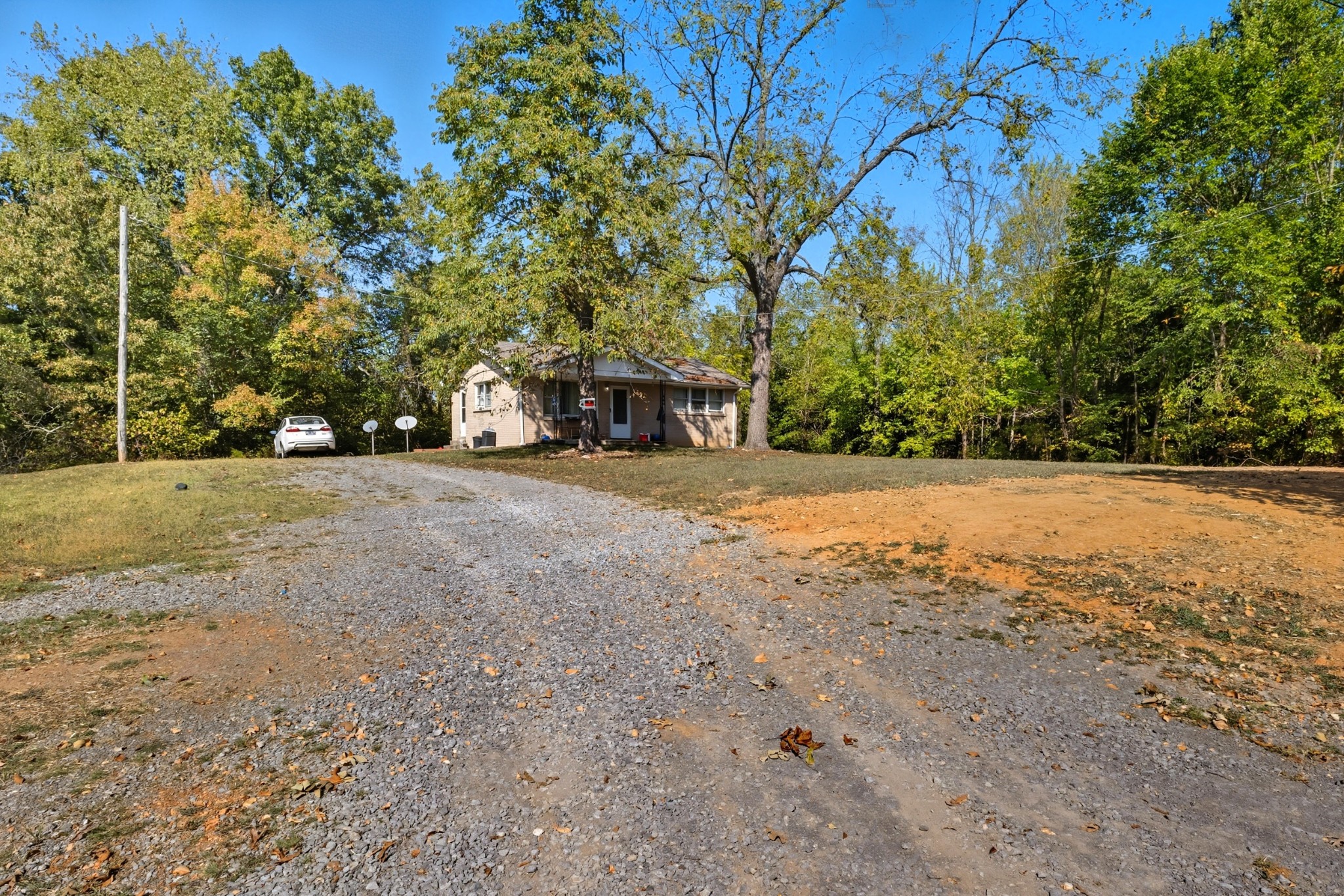 833 Grays Chapel Road Southside, TN 37171 - Photo 5 of 23 a view of a field with trees in front of it