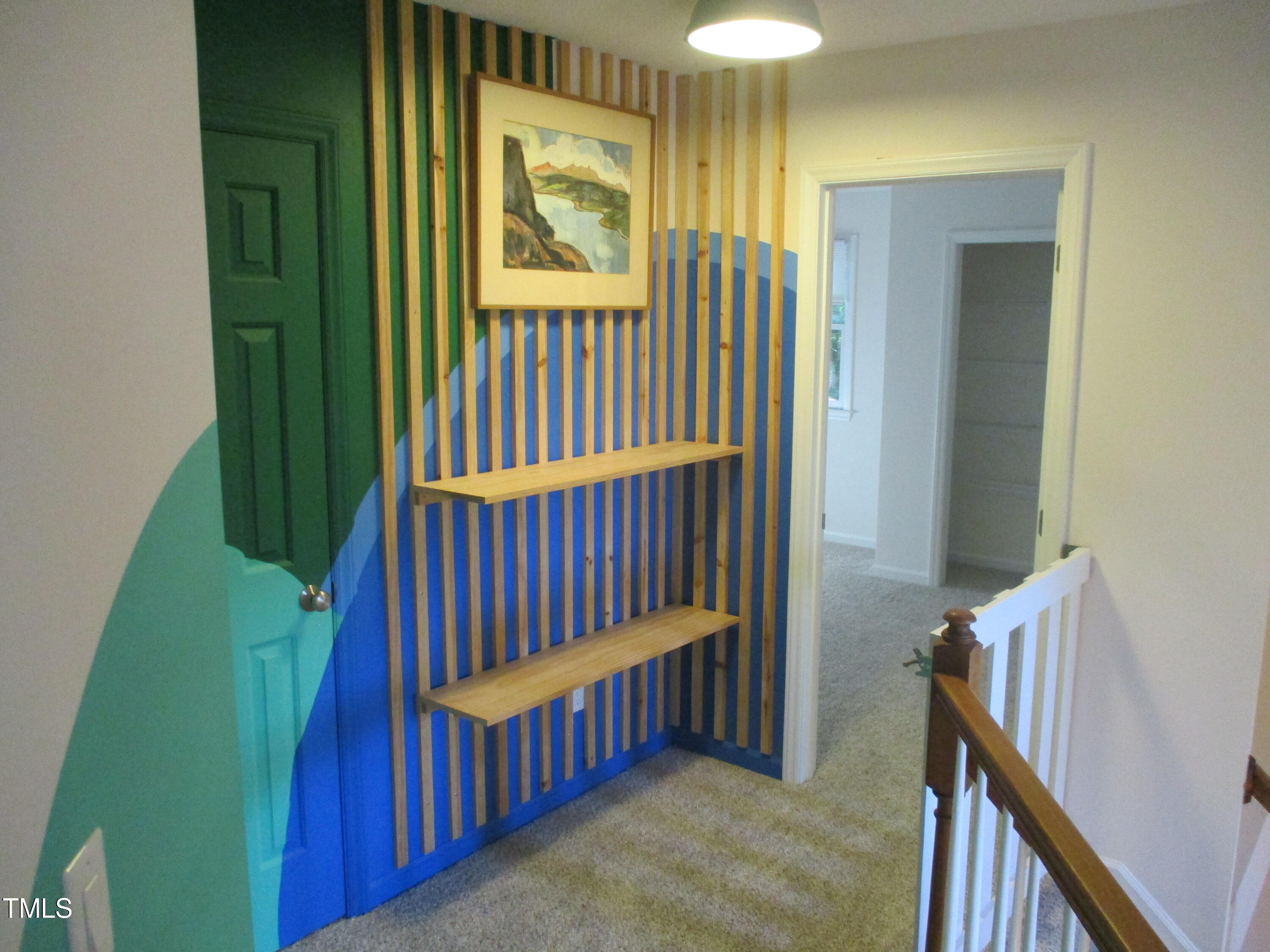 5315 Reams Run Road Durham, NC 27713 - Photo 25 of 49 a view of staircase with railing and a chandelier