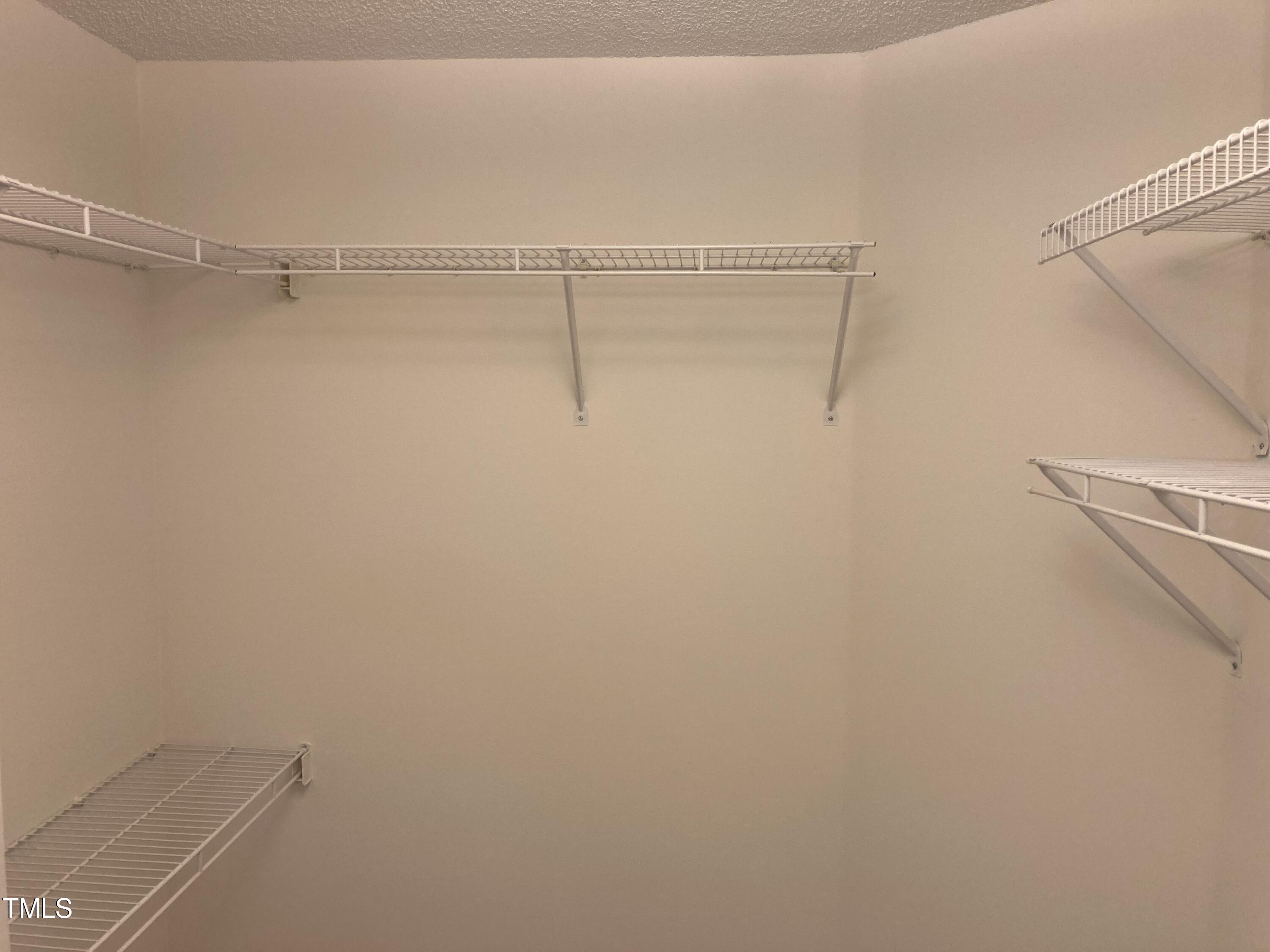 5315 Reams Run Road Durham, NC 27713 - Photo 35 of 49 a view of a room with racks on the wall