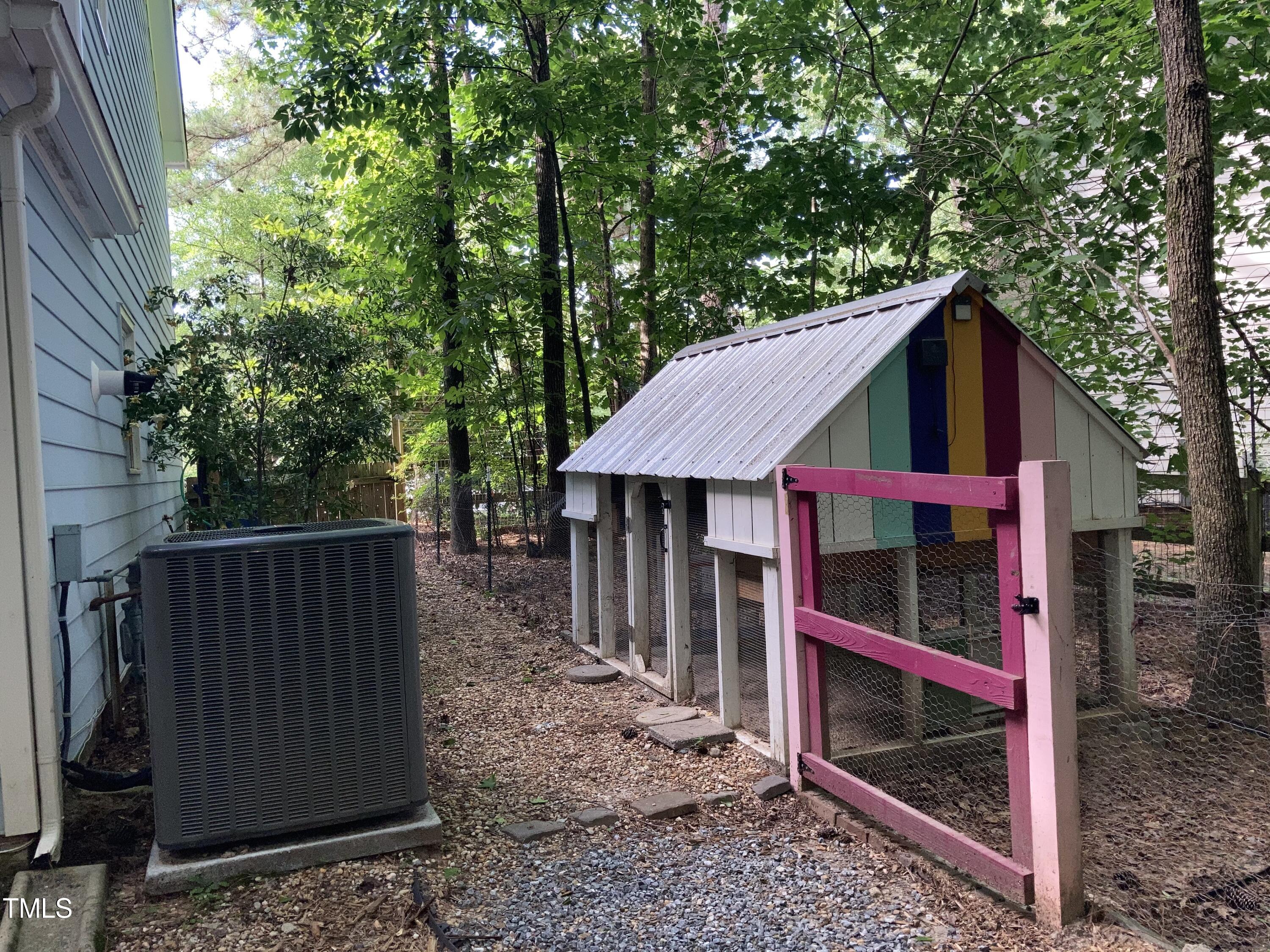 5315 Reams Run Road Durham, NC 27713 - Photo 47 of 49 a wooden house with large trees in front of it