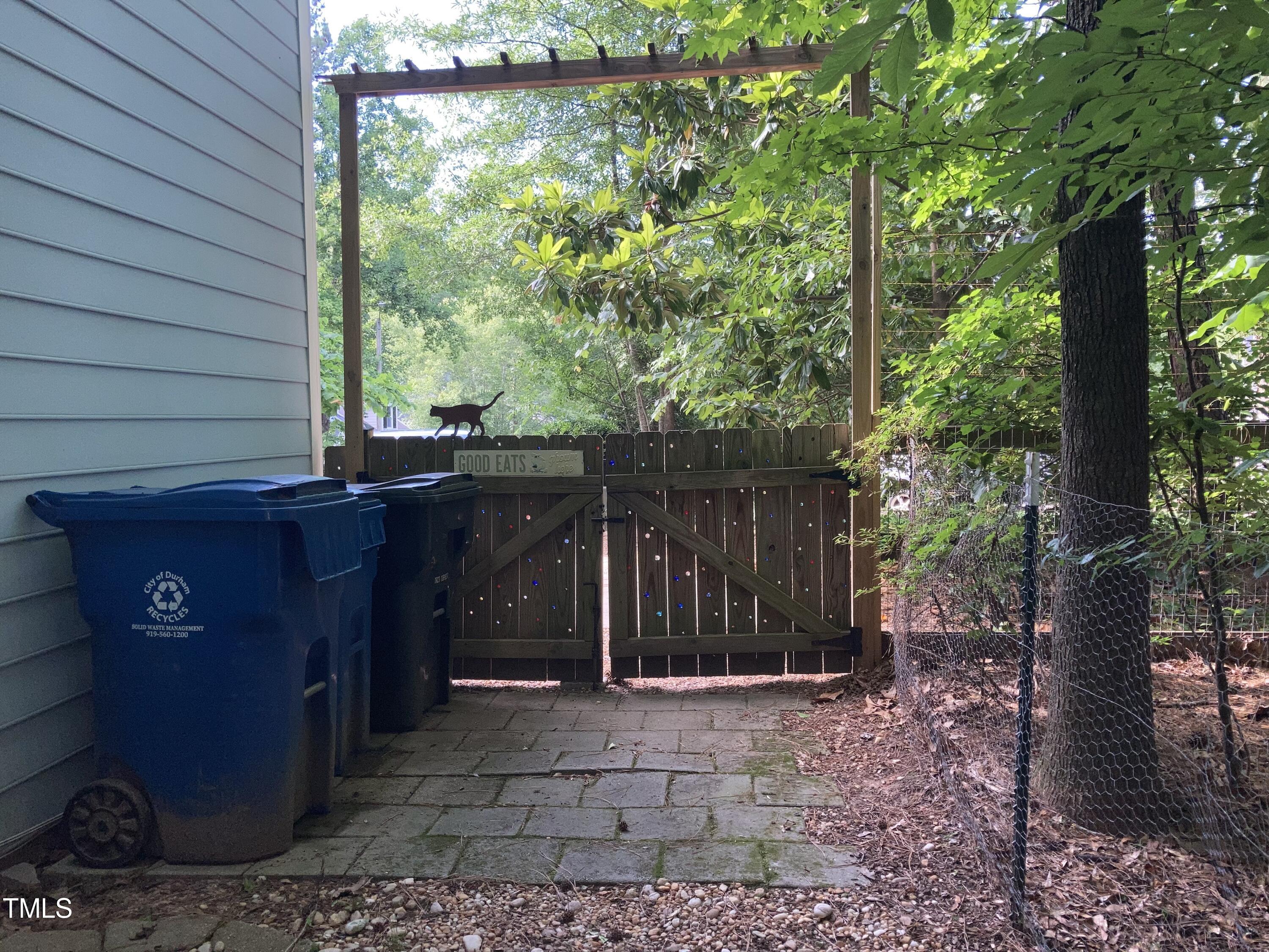 5315 Reams Run Road Durham, NC 27713 - Photo 48 of 49 a view of a backyard with plants and large trees