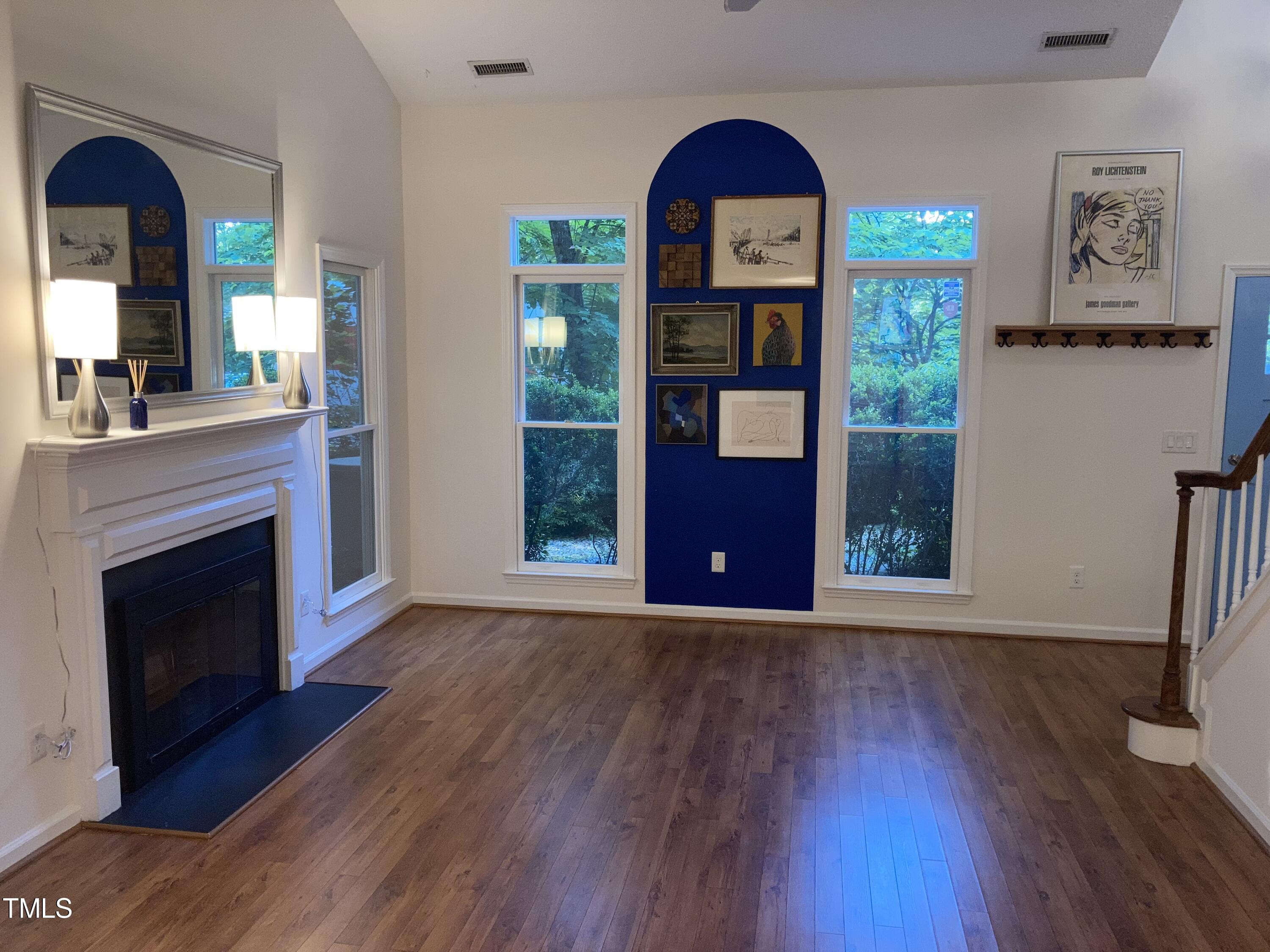 5315 Reams Run Road Durham, NC 27713 - Photo 6 of 49 a view of a livingroom with furniture and a fireplace
