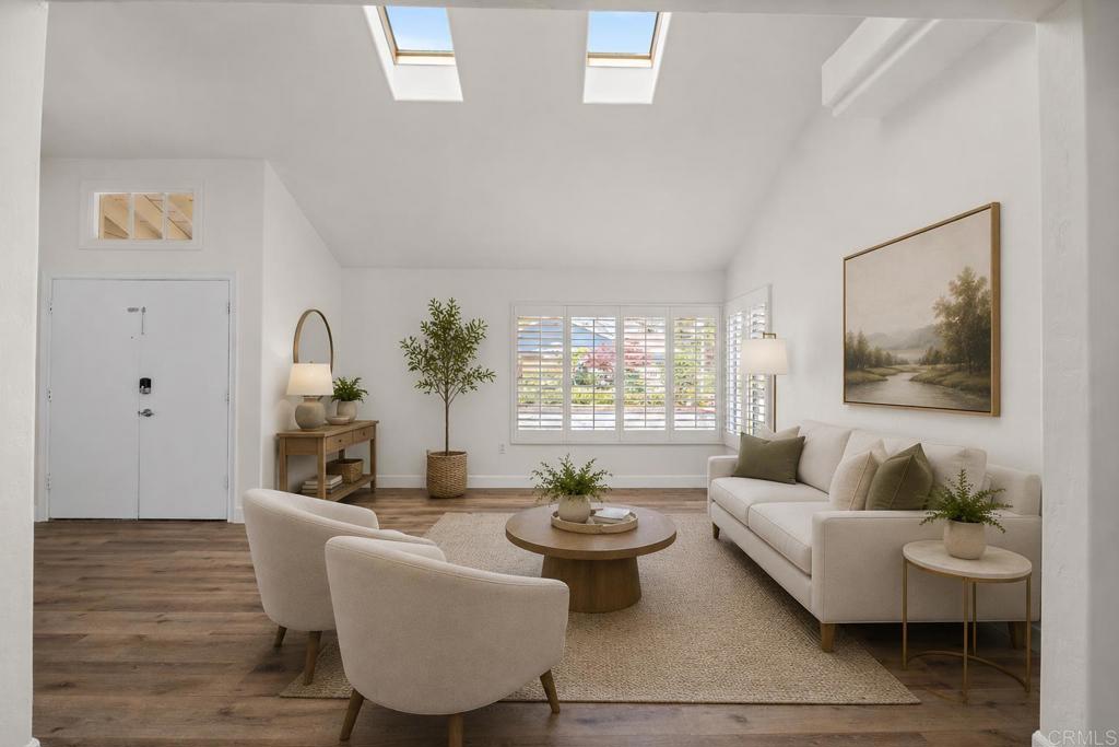 4595 Blackwell Road Oceanside, CA 92056 - Photo 5 of 47 a living room with furniture potted plant and a window