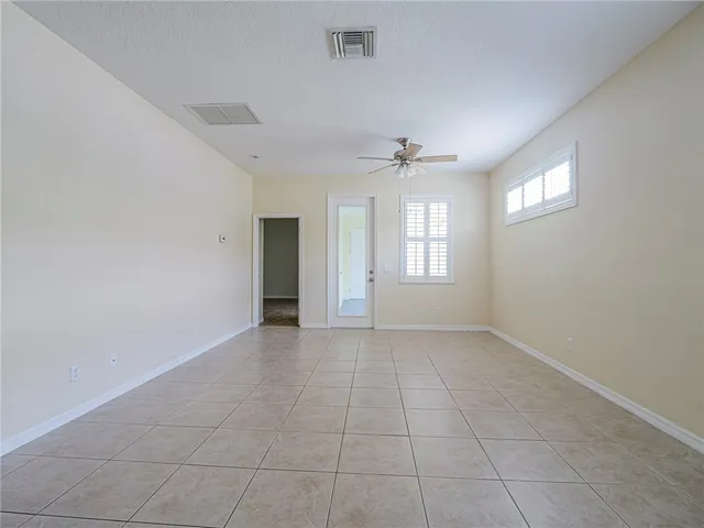 a kitchen with stainless steel appliances granite countertop a sink and a refrigerator
