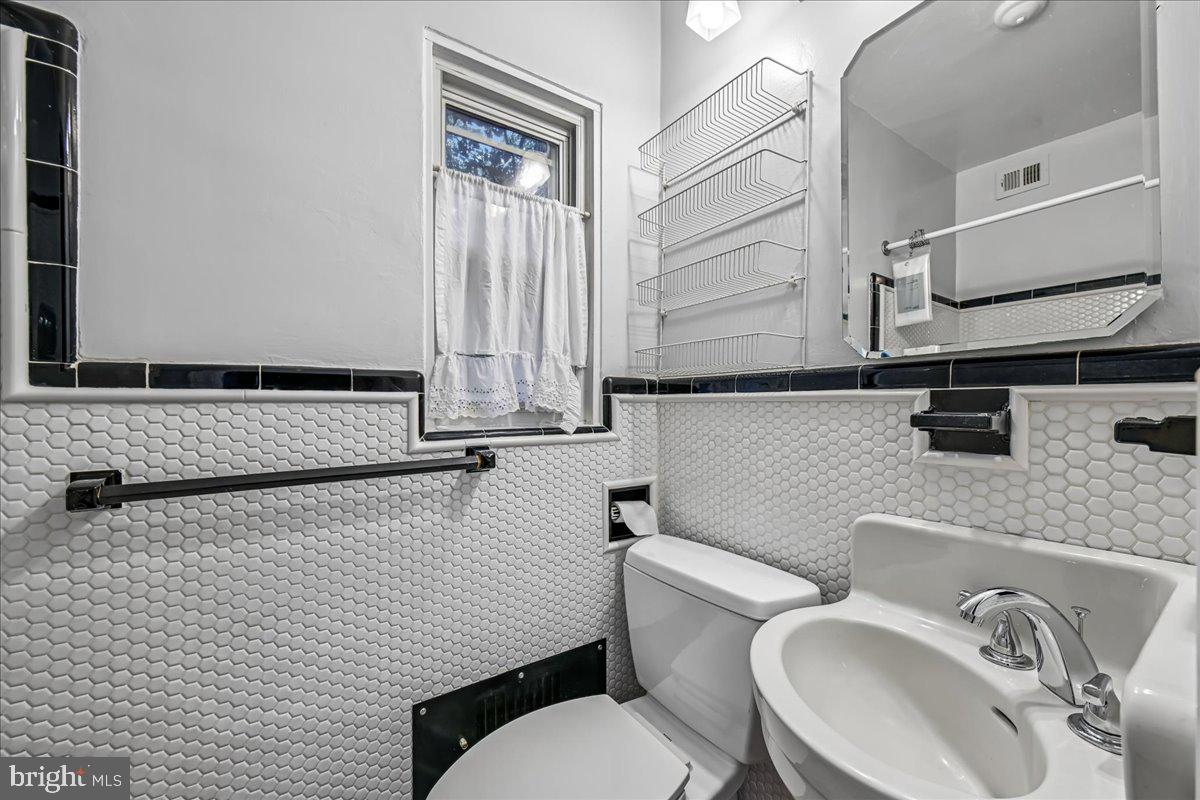 3201 Circle Hill Road Alexandria, VA 22305 - Photo 18 of 37 main floor bathroom off bedroom/office
