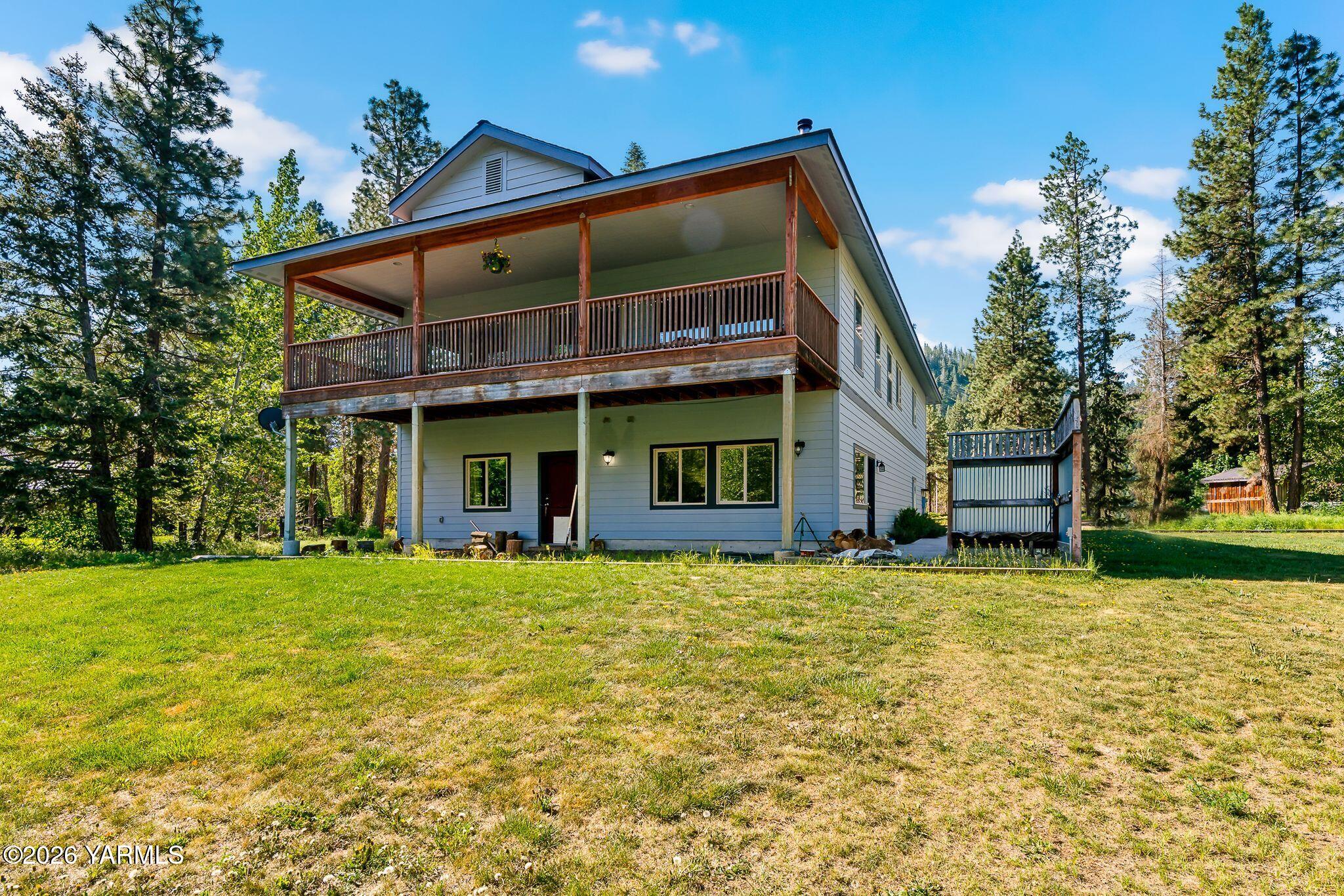 1575 Nile Road Naches, WA 98937 - Photo 36 of 51 a view of a house with a yard and sitting area