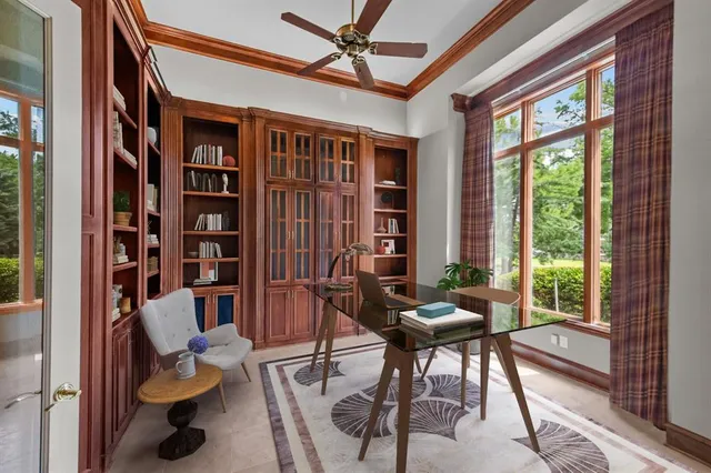 a view of a porch with furniture and garden