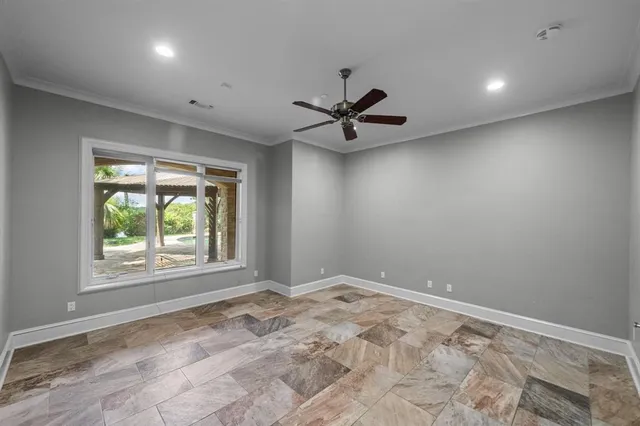 a view of a livingroom with furniture and a window
