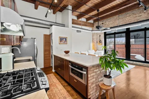 $389,000 | 1670 North Claremont Avenue, Unit 306, Chicago, IL 60647