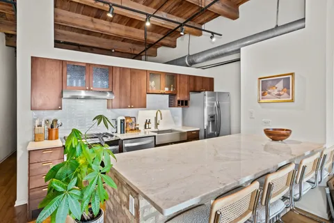 $389,000 | 1670 North Claremont Avenue, Unit 306, Chicago, IL 60647