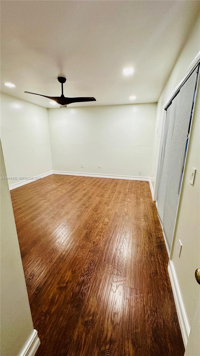 528 Southwest 166th Terrace Weston, FL 33326 - Photo 5 of 14 a view of a room with wooden floor
