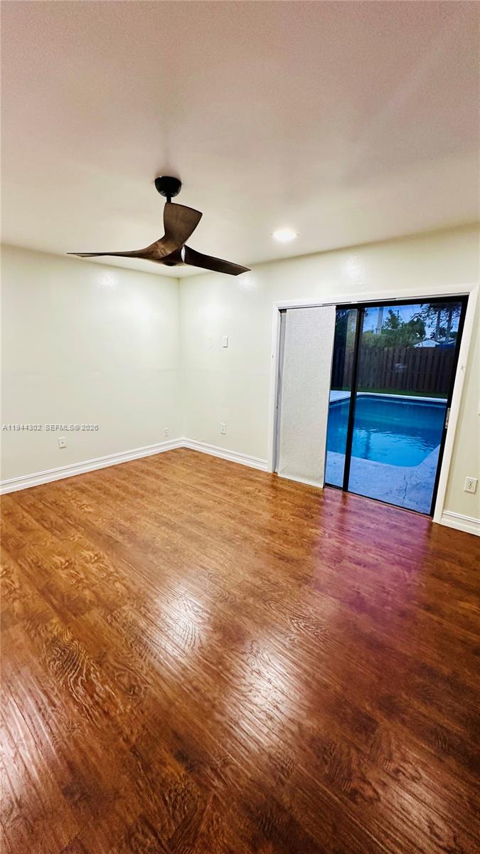 528 Southwest 166th Terrace Weston, FL 33326 - Photo 6 of 14 a view of a room with wooden floor
