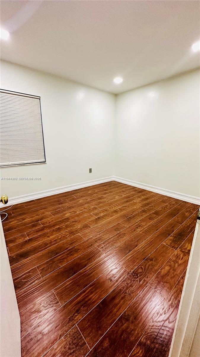 528 Southwest 166th Terrace Weston, FL 33326 - Photo 10 of 14 a view of room and wooden floor