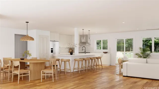 a large kitchen with lots of counter space and windows