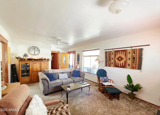 a view of an entryway with wooden floor and stuff