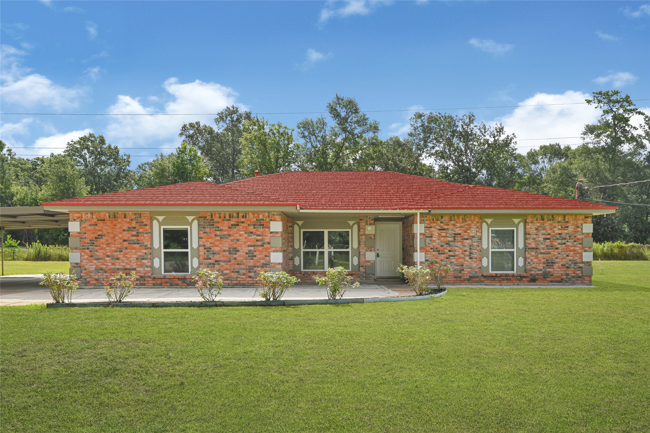20135 Timber Line Lane New Caney, TX 77357 - Photo 1 of 30 a front view of house with yard and green space