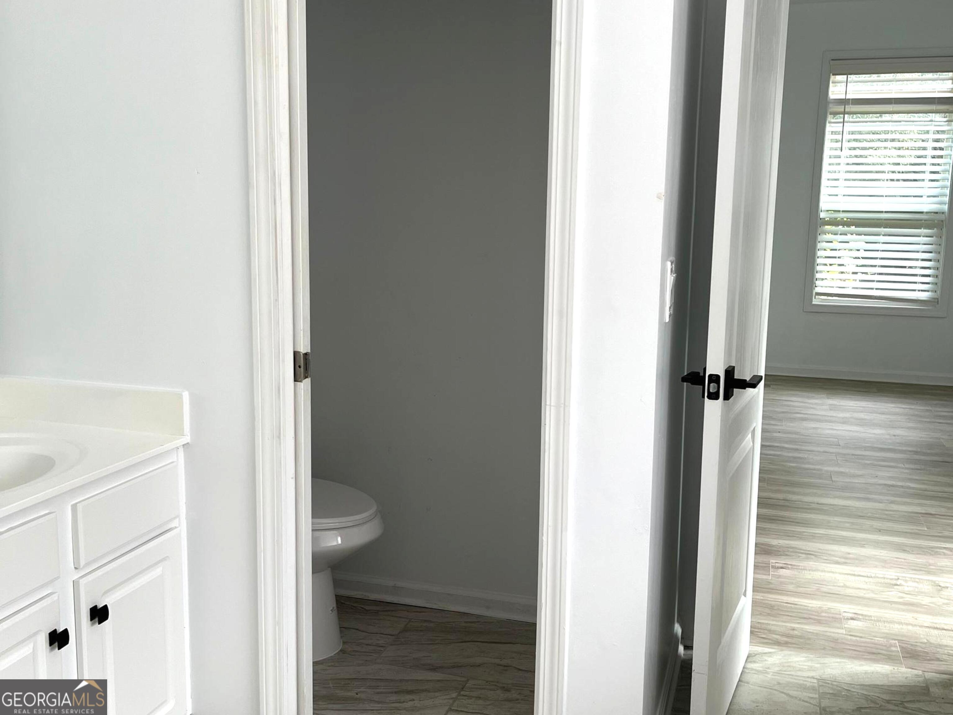 6127 Landers Loop Fairburn, GA 30213 - Photo 14 of 21 a view of bathroom with a toilet