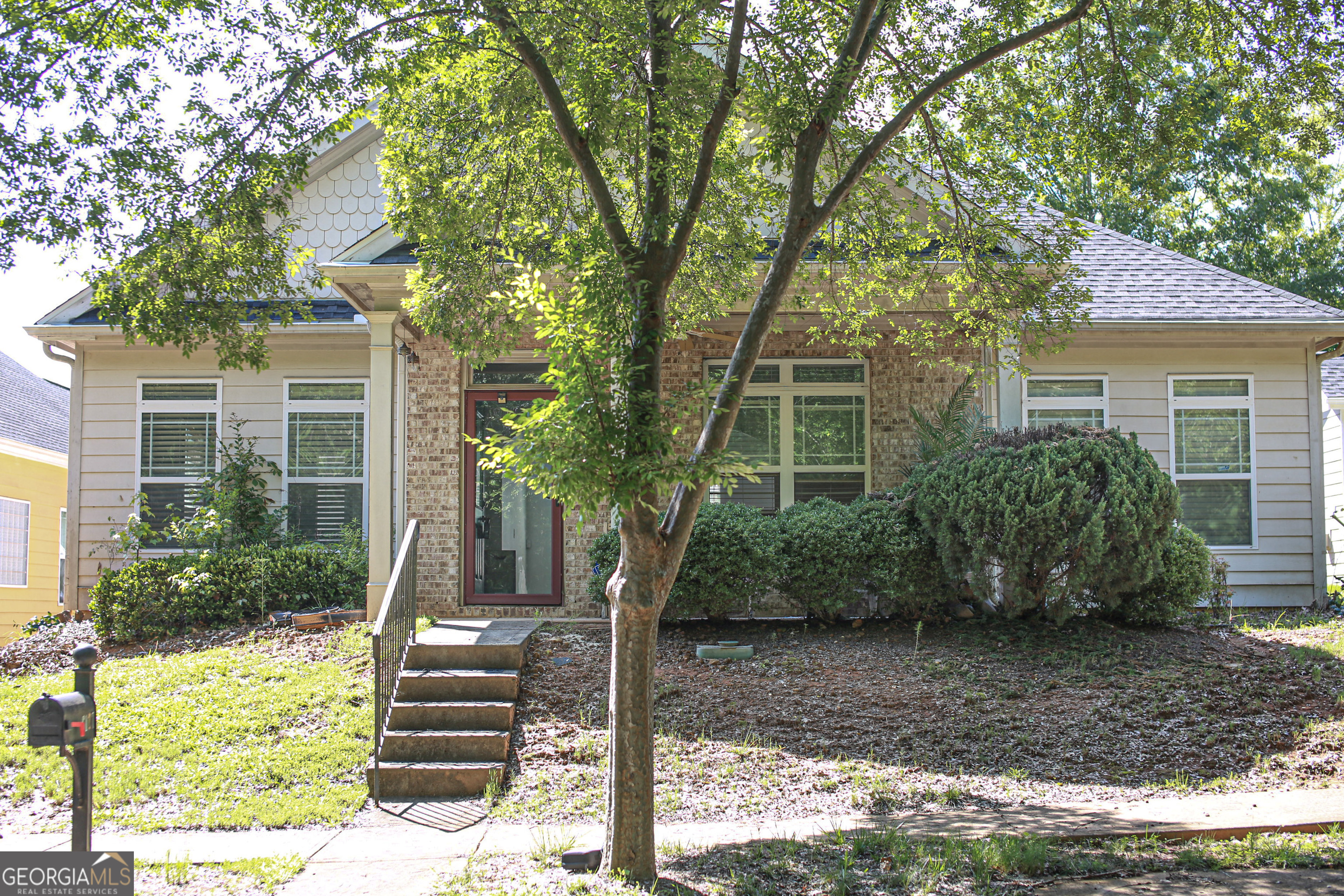 6127 Landers Loop Fairburn, GA 30213 - Photo 3 of 21 a front view of a house with garden