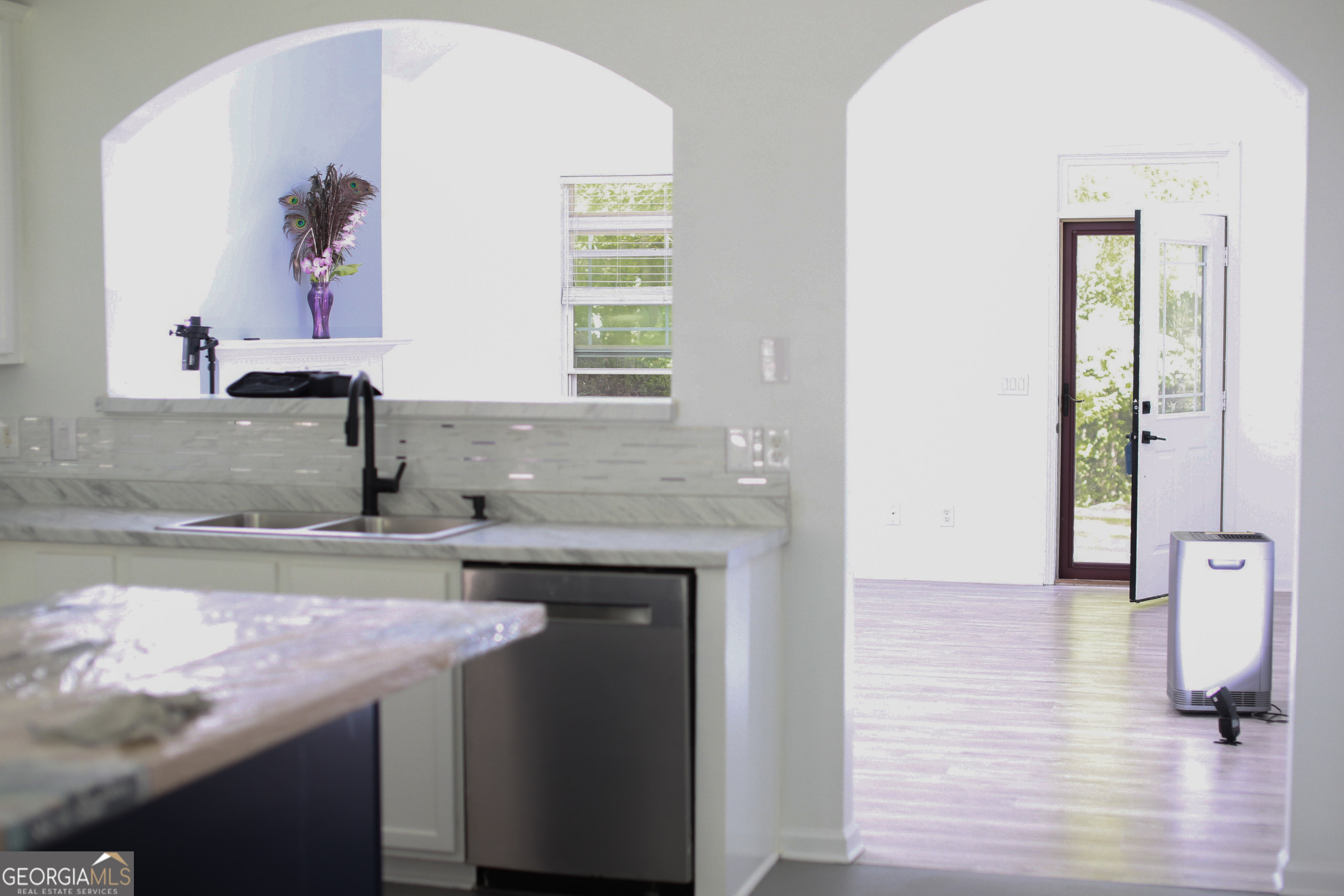 6127 Landers Loop Fairburn, GA 30213 - Photo 6 of 21 a kitchen with a sink and cabinets