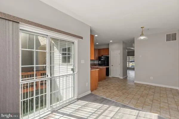 a view of kitchen with windows