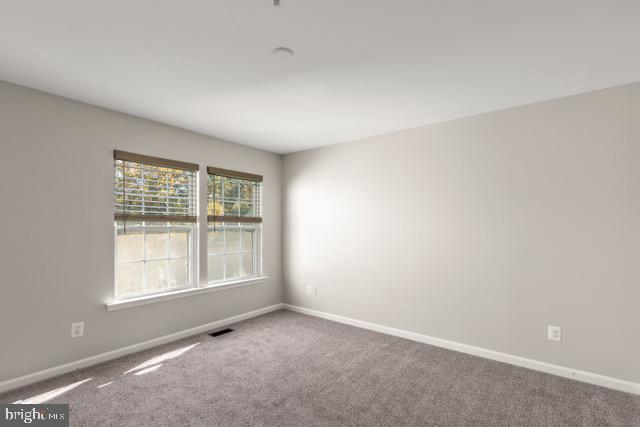 722 Cardiff Circle Edgewood, MD 21040 - Photo 17 of 38 an empty room with windows