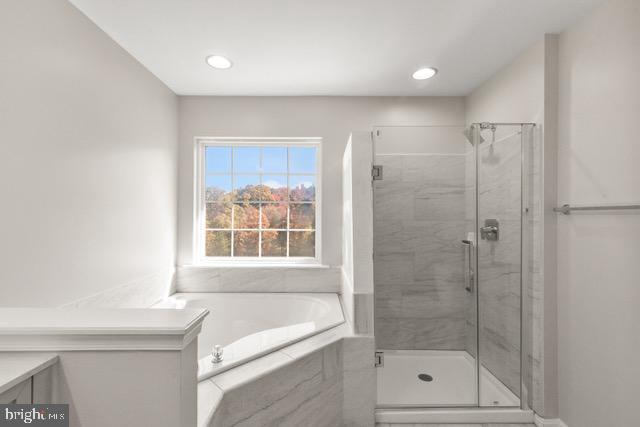 722 Cardiff Circle Edgewood, MD 21040 - Photo 21 of 38 a bathroom with a bathtub and a shower