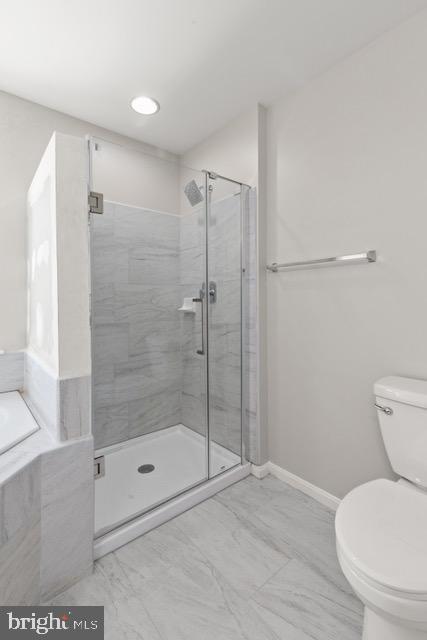 722 Cardiff Circle Edgewood, MD 21040 - Photo 23 of 38 a bathroom with a shower and a toilet