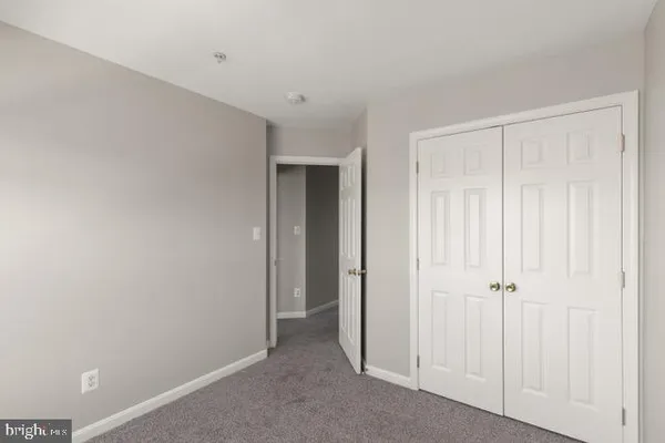 an empty room with closet