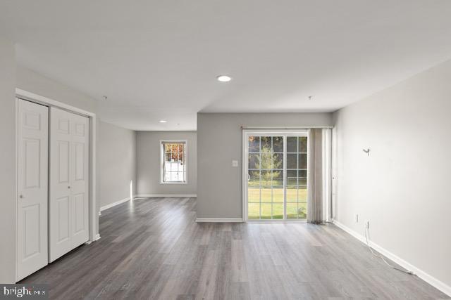 722 Cardiff Circle Edgewood, MD 21040 - Photo 29 of 38 a view of an empty room with wooden floor and window