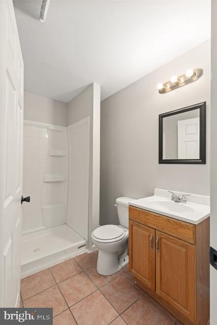 722 Cardiff Circle Edgewood, MD 21040 - Photo 33 of 38 a bathroom with a toilet sink and mirror