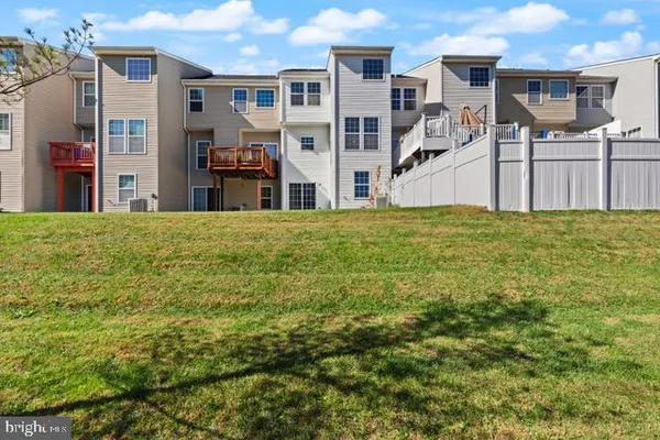 a view of a big yard in front of a building