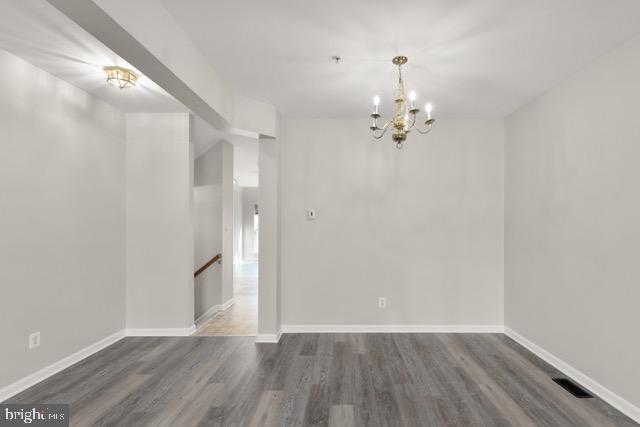 722 Cardiff Circle Edgewood, MD 21040 - Photo 7 of 38 wooden floor in an empty room with a window