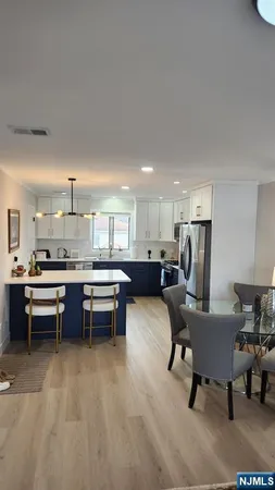 a spacious bedroom with a bed and window