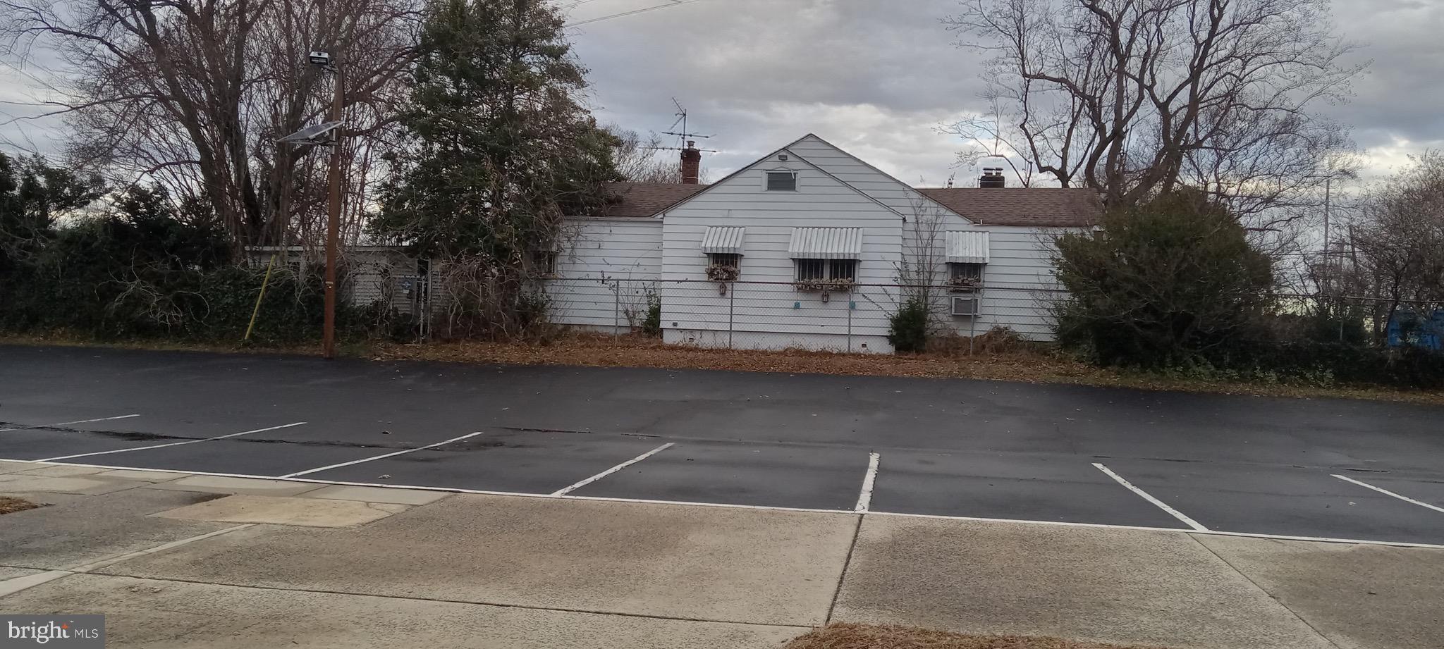 933 36th Street Camden, NJ 08105 - Photo 3 of 4 a front view of a house with a yard