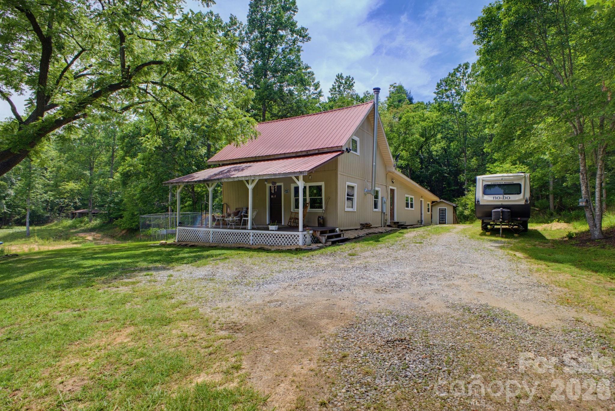 1239 Mcguinn Road Mill Spring, NC 28756 - Photo 1 of 47