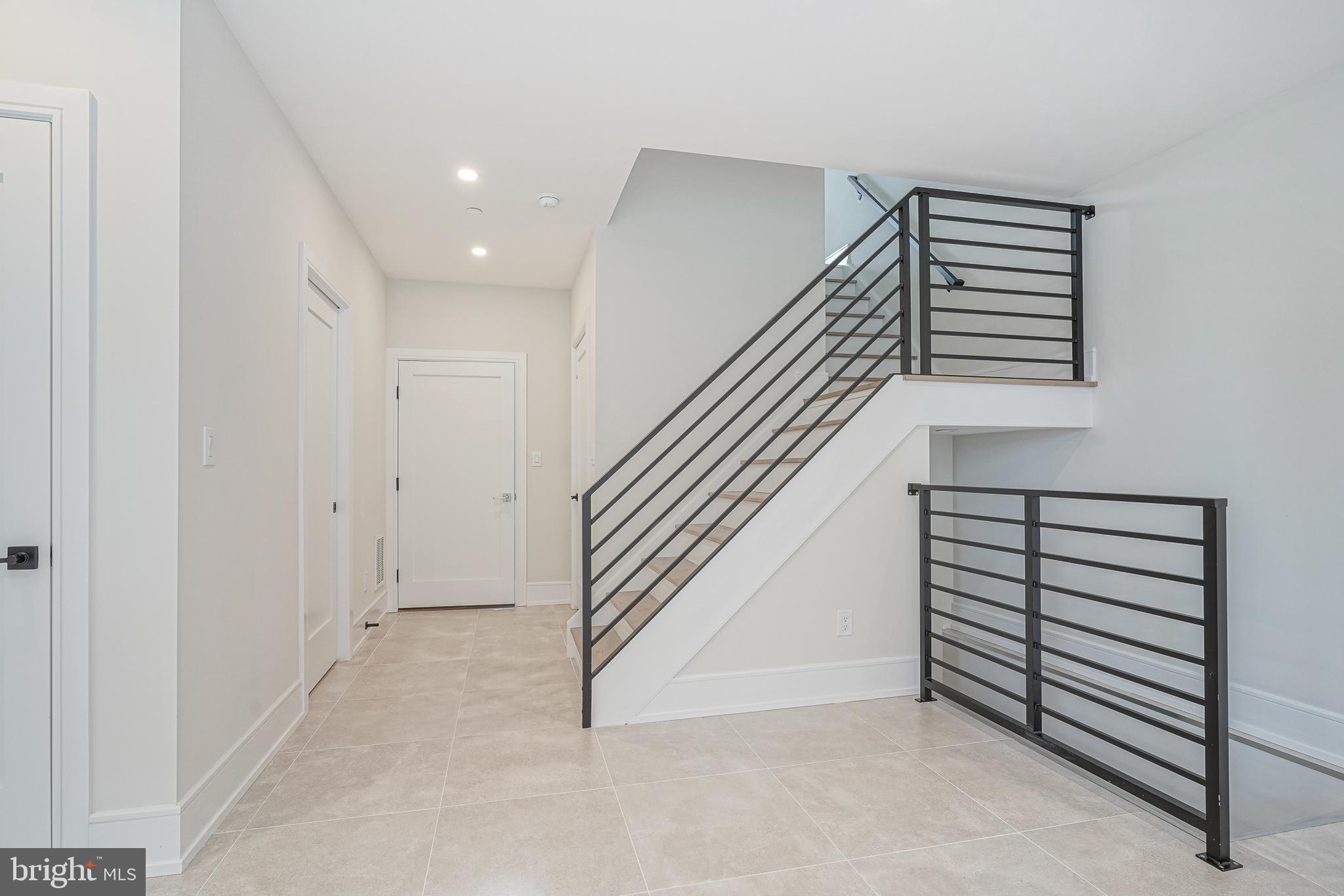 2002 Renaissance Walk, Unit 2 Philadelphia, PA 19145 - Photo 6 of 66 Main level, entrance from 2 car garage, 1/2 bath,