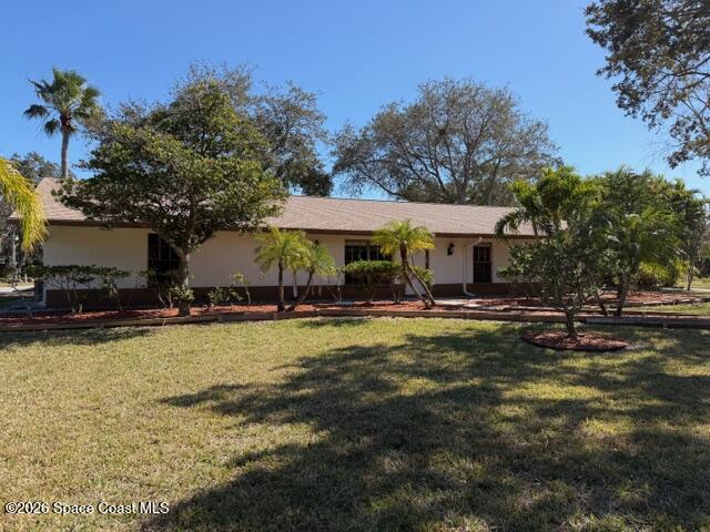 1201 Northeast Tropicana Road Palm Bay, FL 32905 - Photo 3 of 23 a view of a house with swimming pool and sitting area