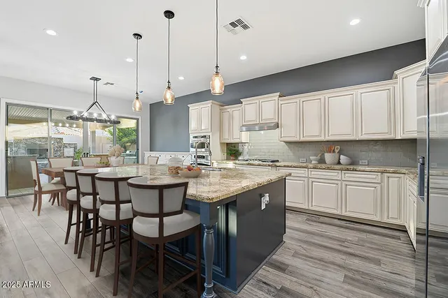 a view of a house with a yard and garage
