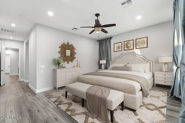 a bathroom with a tub a sink and a window