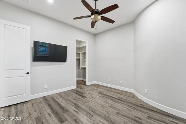 a view of cabinets and wooden floor