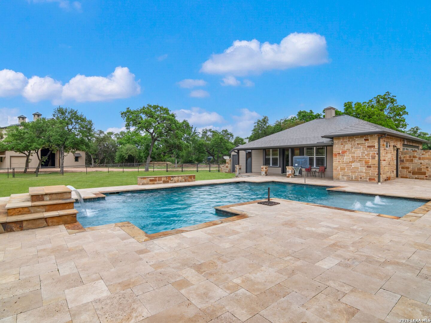 103 South Cibolo Hollow Fair Oaks Ranch, TX 78015 - Photo 48 of 79 a view of a house with swimming pool and sitting area