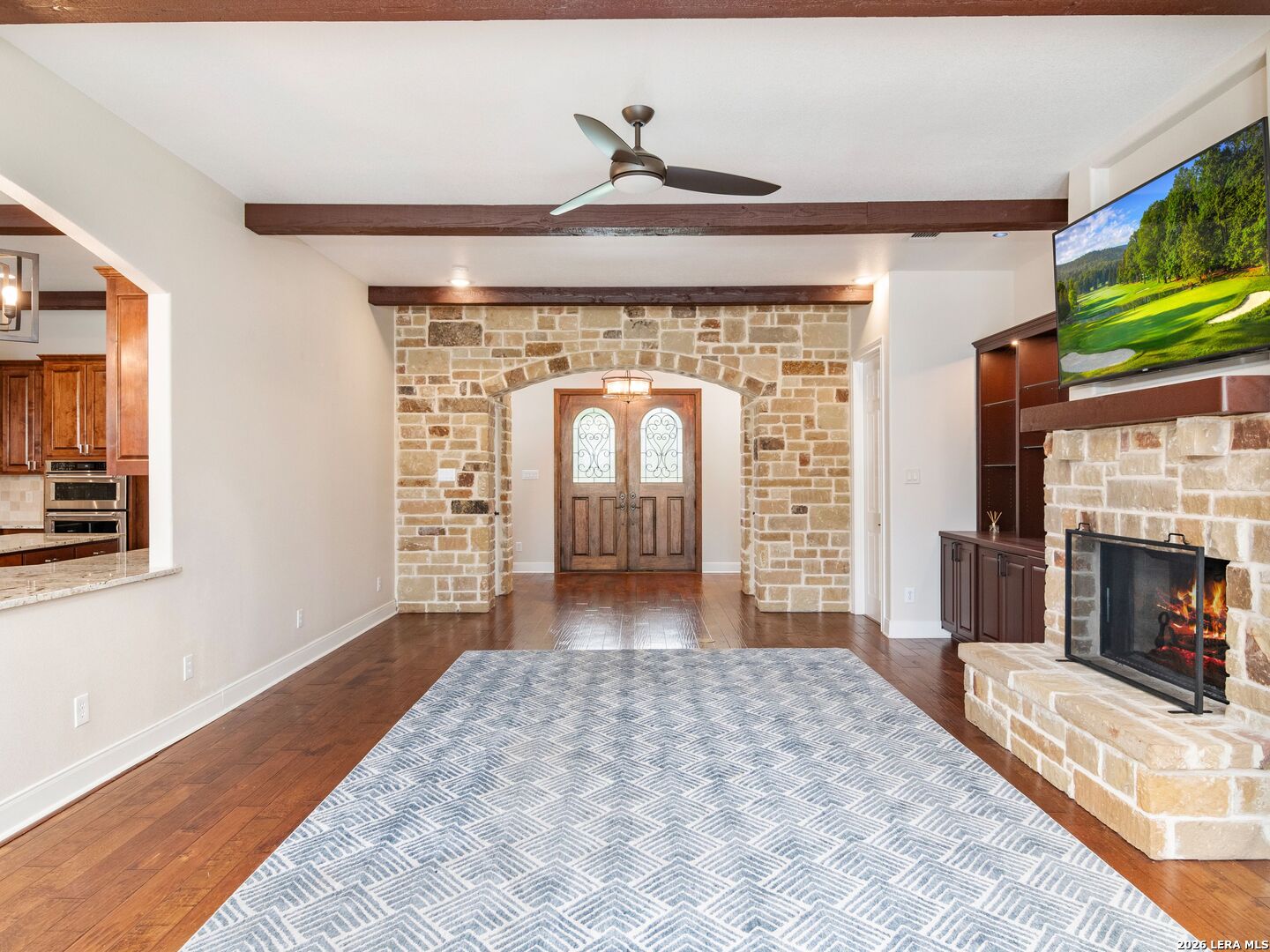 103 South Cibolo Hollow Fair Oaks Ranch, TX 78015 - Photo 7 of 79 a view of livingroom with fireplace and window